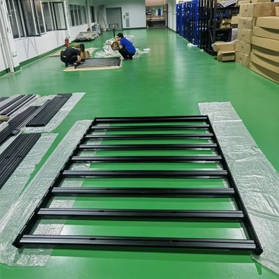 Op maat gemaakte onderdelen van bestelwagens Camper Van Roof Rack Platform in zwart voor outdoor camping activiteiten